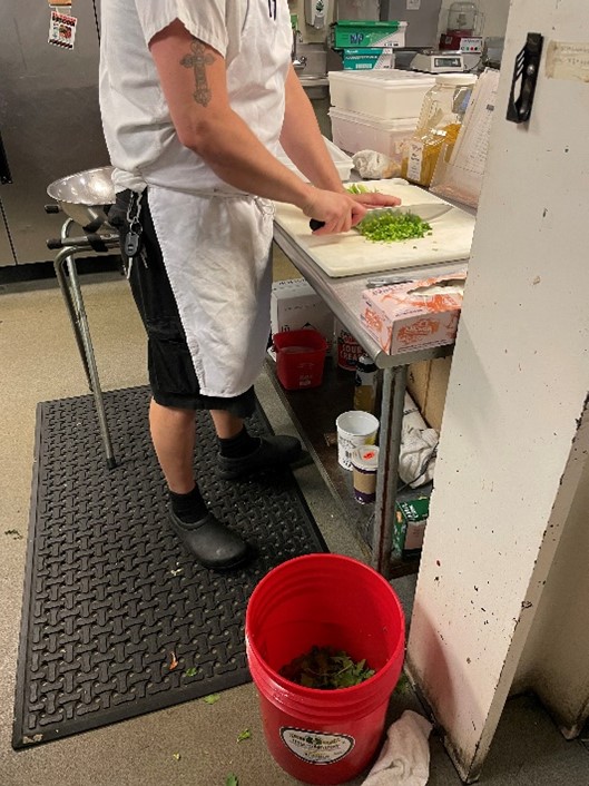 Five-gallon compost bin in the commissary kitchen.